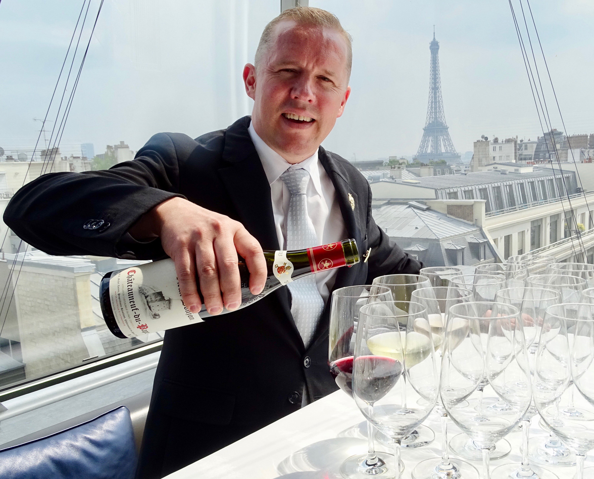 Peninsula Hotel head sommelier Nicolas Charrière serving wine