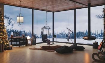 Gros plan sur le salon d'un magnifique chalet décoré avec goût en pleine montagne